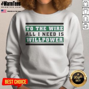 Top To The Wire All I Need Is Willpower sweatshirt in a cozy setting, perfect for casual wear.