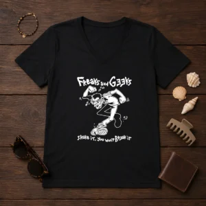Awesome Freaks And Geeks Shake It You Wont Break It V Neck Shirt in dark color with bold graphic print