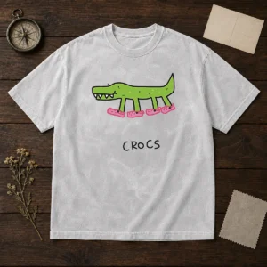 Funny Crocs Crocodile Wearing Pink Shoes Drawing on a soft washed t shirt in light gray