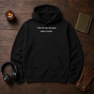 Good I Flirt For Fun But Panic When It Works Hoodie in dark gray with front graphic print and adjustable hood