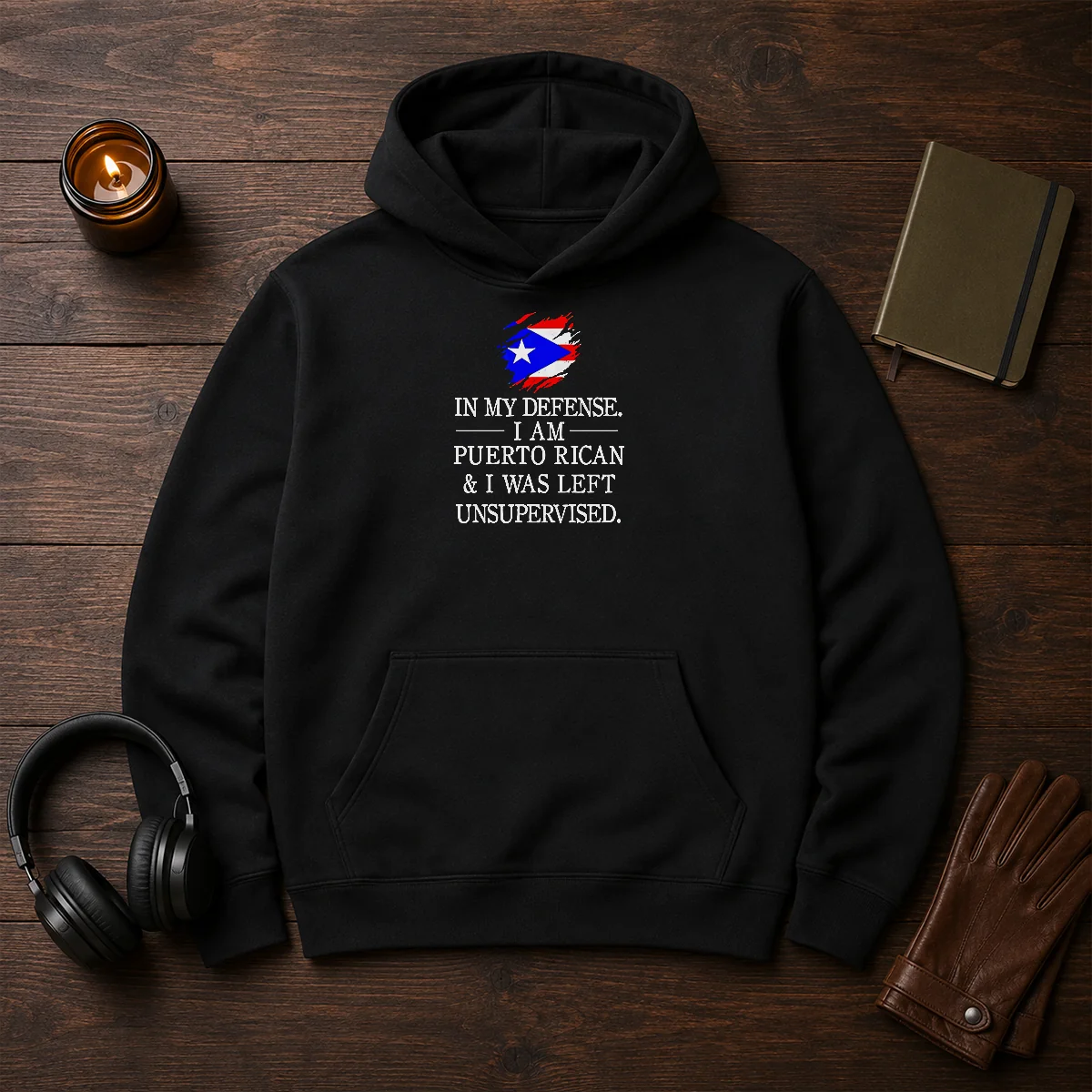 Good Puerto Rican In My Defense I Am Puerto Rican And I Was Left Unsupervised Hoodie in black, front view with bold white text
