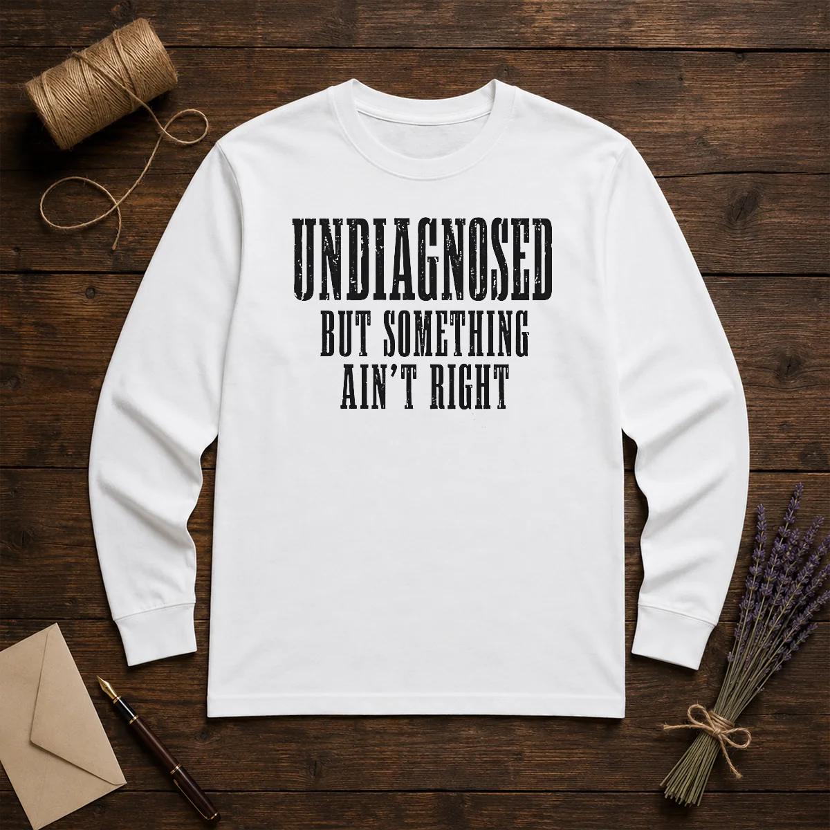 Good Undiagnosed But Something Ain'T Right Chronic Illness long sleeve shirt in white, front view with clear text design