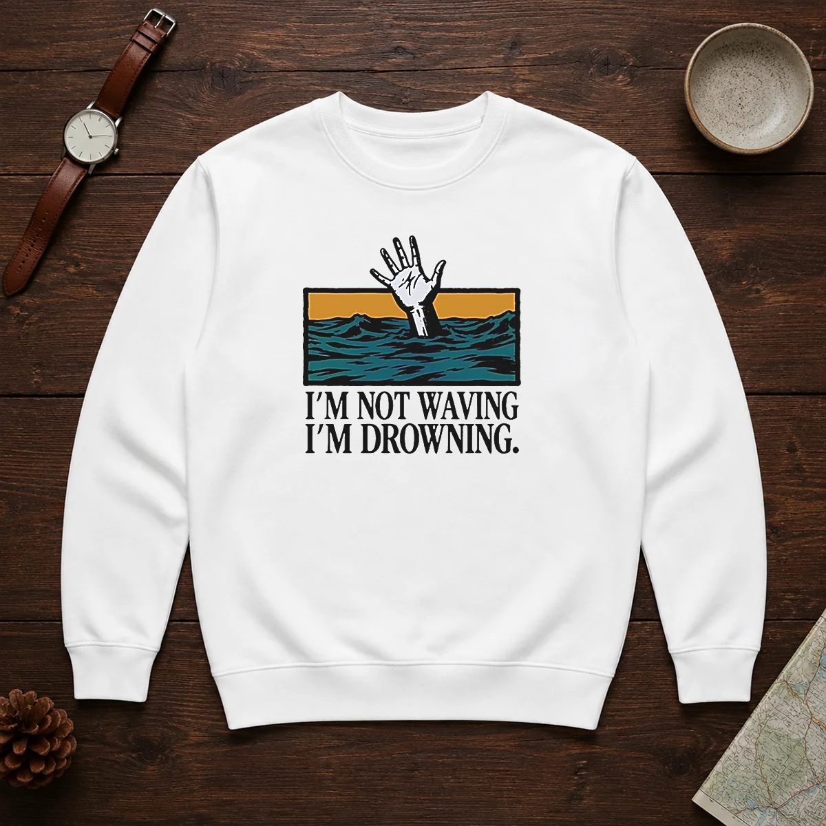 Hot I'M Not Waving I'M Drowning Sweater in dark color showing front graphic design and crew neck style