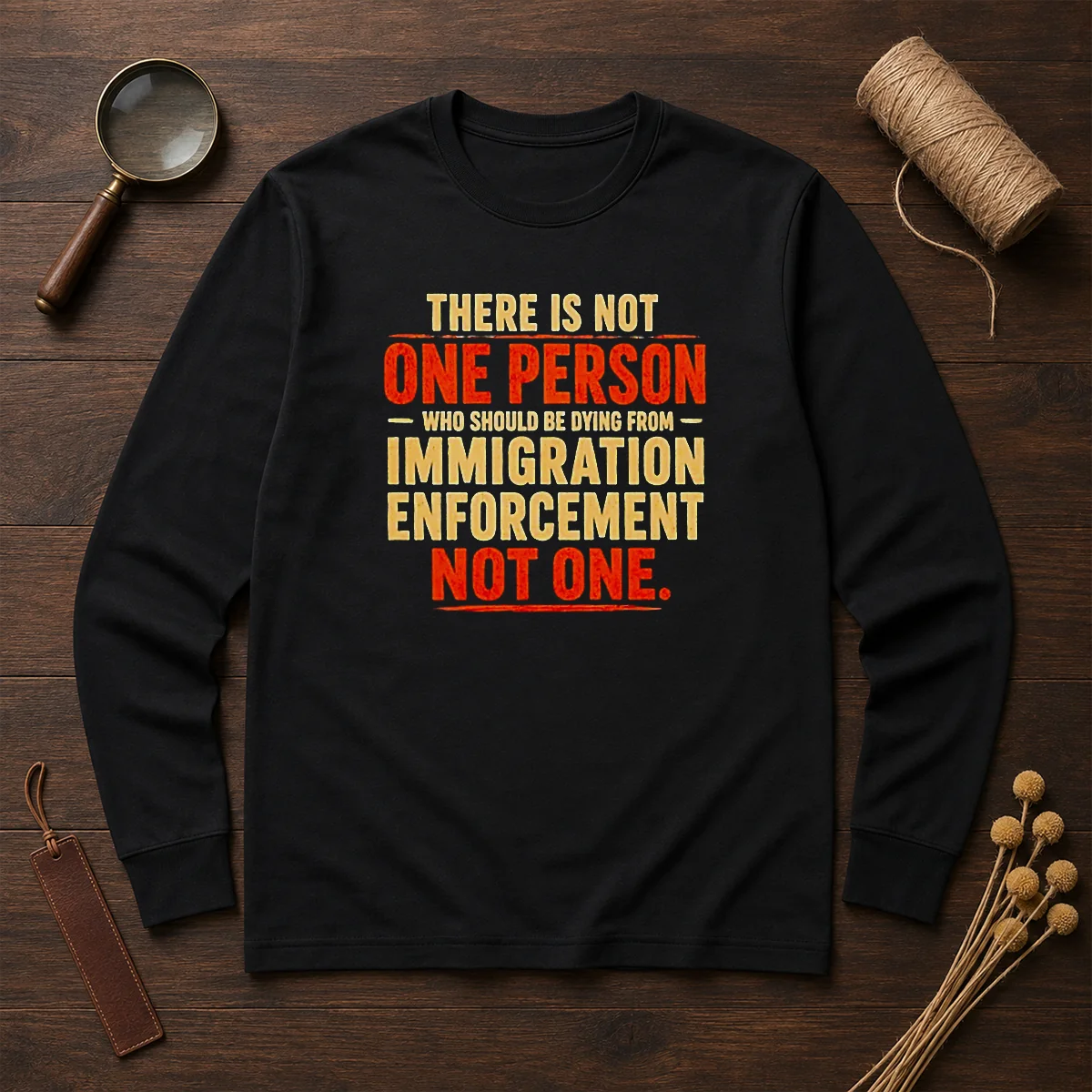 Original There Is Not One Person WHO Should Be Dying From Immigration Enforcement long sleeve shirt in black with bold white text