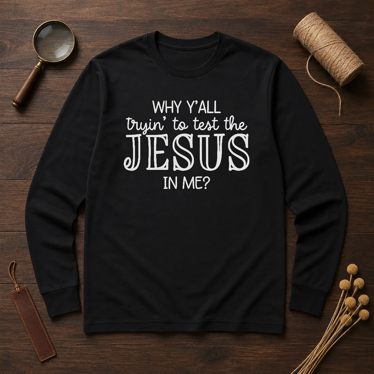 Original Why Y'All Trying To Test The Jesus In Me Long Sleeve Shirt in black, featuring bold white text on front