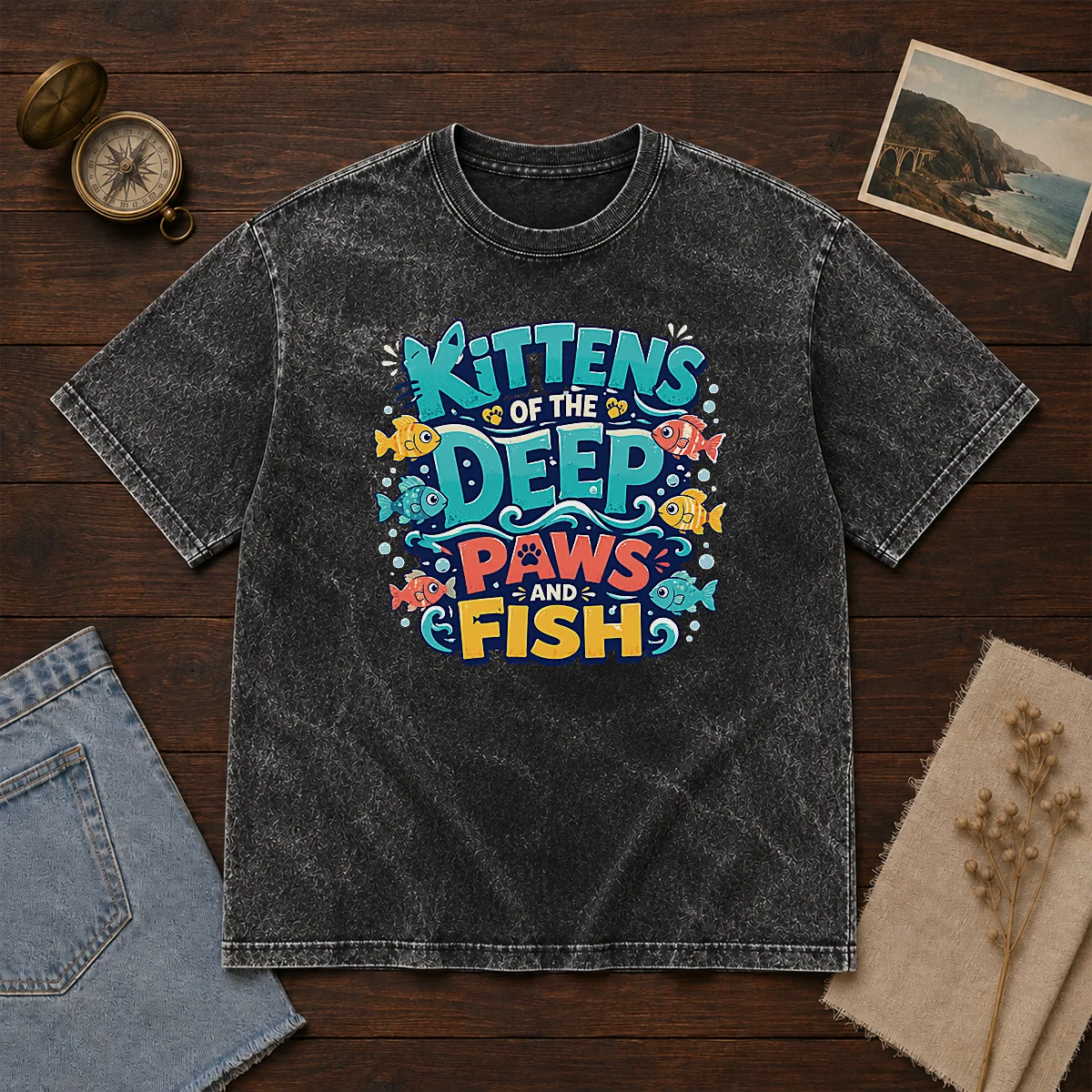 Premium Kittens Of The Deep Paws And Fish Typography on a soft washed t shirt, front view with clear print