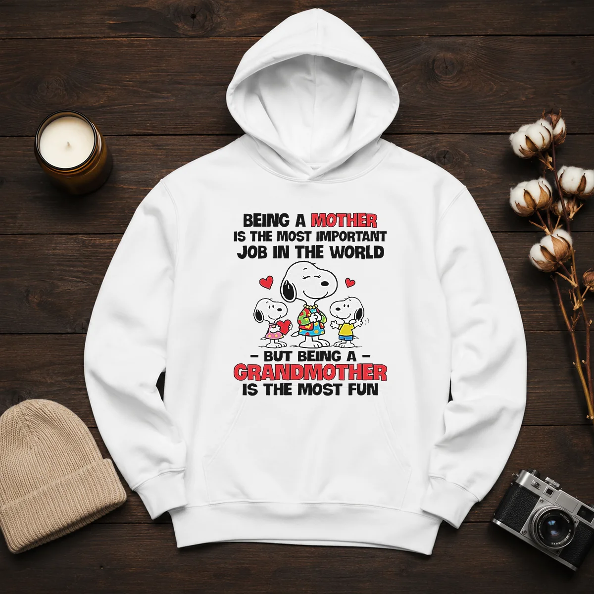 Premium Snoopy Peanuts Being A Mother Is The Most Important Job But Being A Grandmother Hoodie in soft cotton fabric with front pocket and drawstring hood