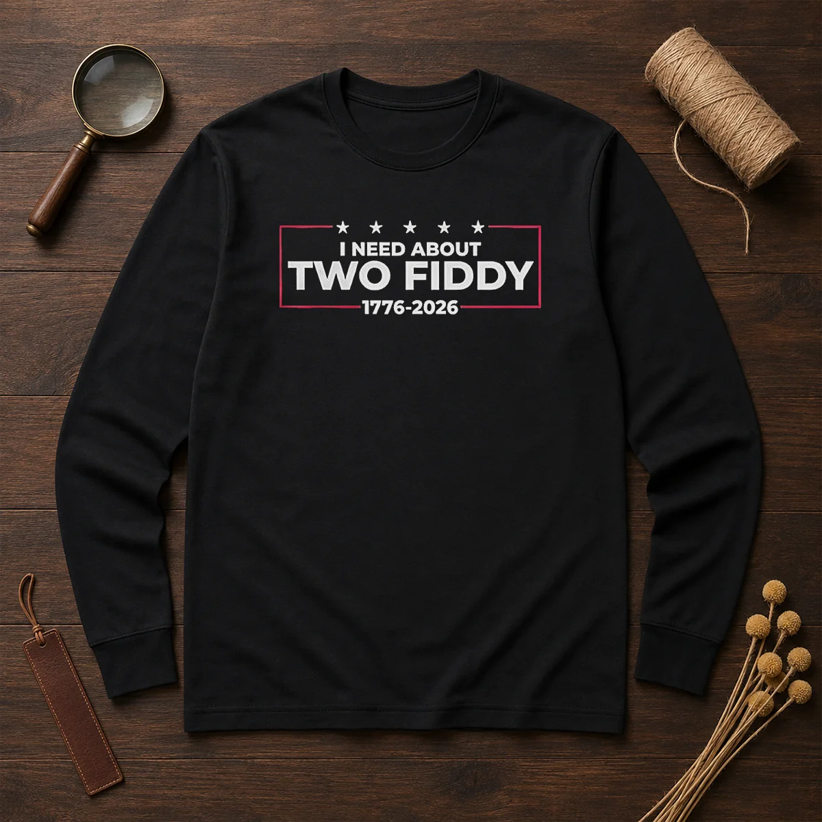 Top I Need About Two Fiddy 1776 2026 long sleeve shirt in classic fit with bold graphic print
