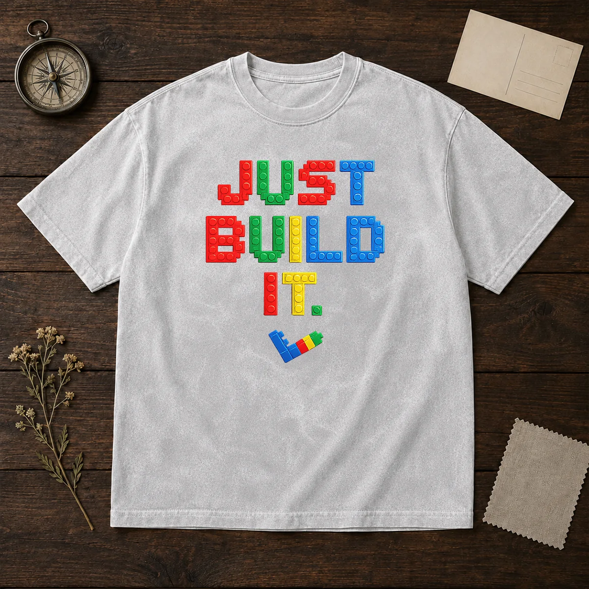 Top Just Build It Master Builder Building Block design on a soft washed t shirt in neutral tones