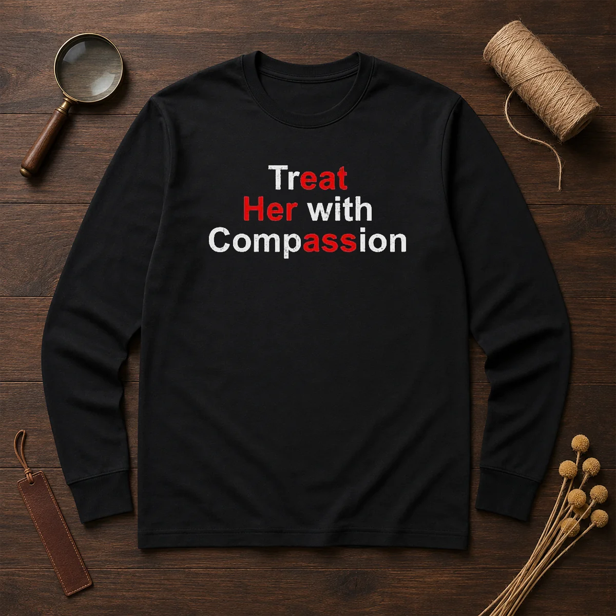 Top Treat Her With Compassion Long Sleeve Shirt in white, front view showing full sleeve length and printed text