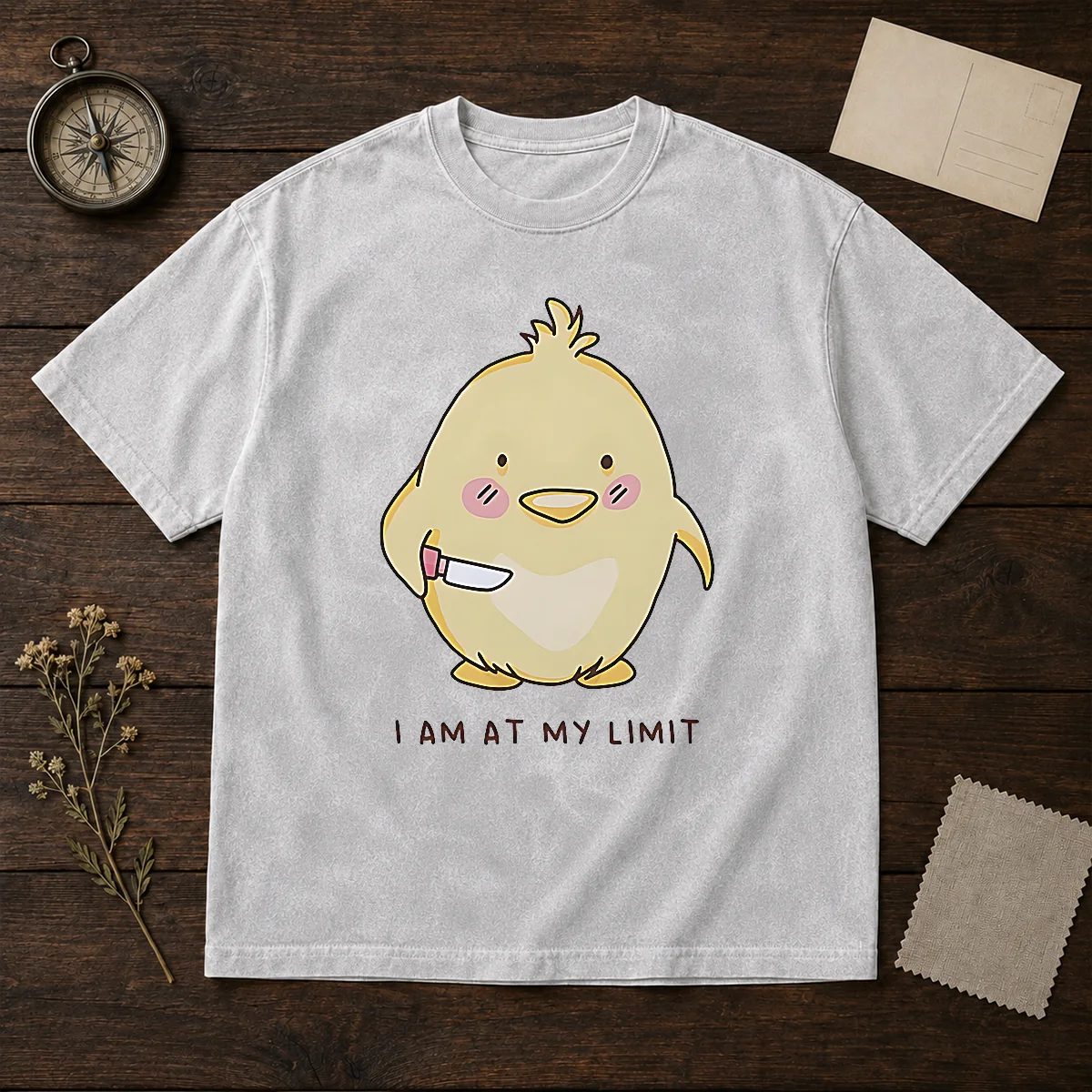 Top Yellow Chick Holding Knife I Am At My Limit washed t shirt featuring a distressed vintage look on soft cotton fabric